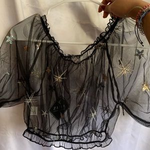 black mesh top with silver stars